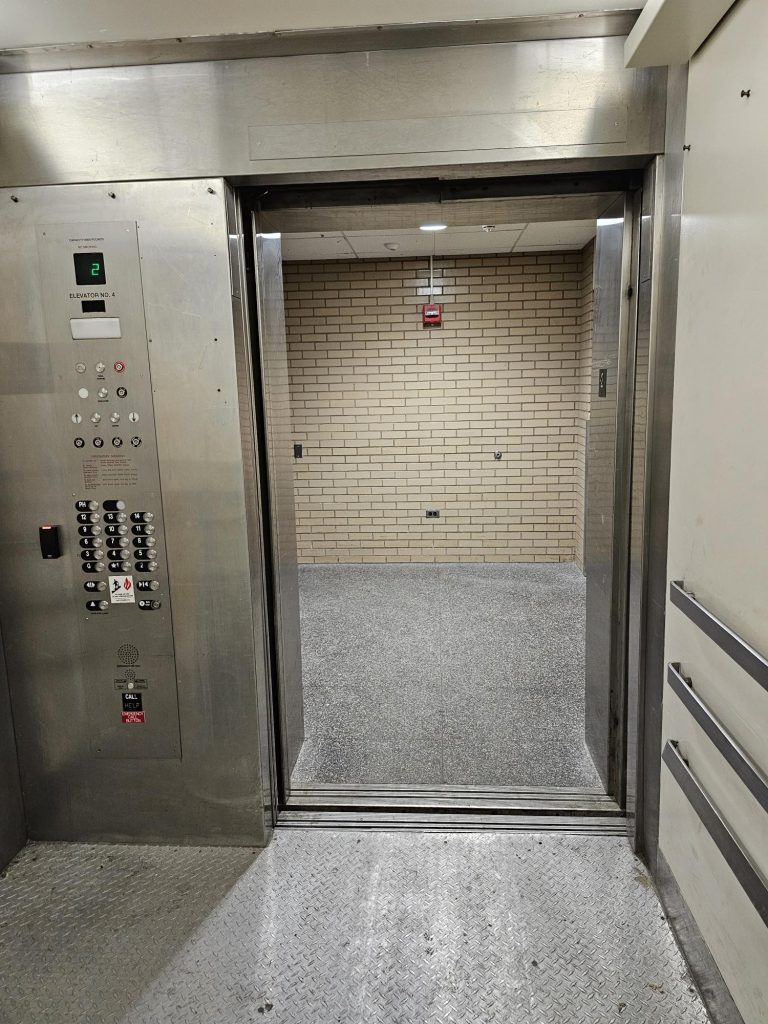 Inside the chevron freight elevator.